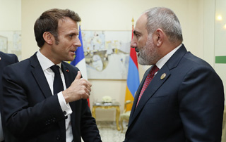 Prime Minister of Armenia and the President of France have a private conversation in Tunisia 

