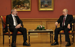 The Prime Minister of Armenia and the President of the Russian Federation hold private conversation in Saint Petersburg